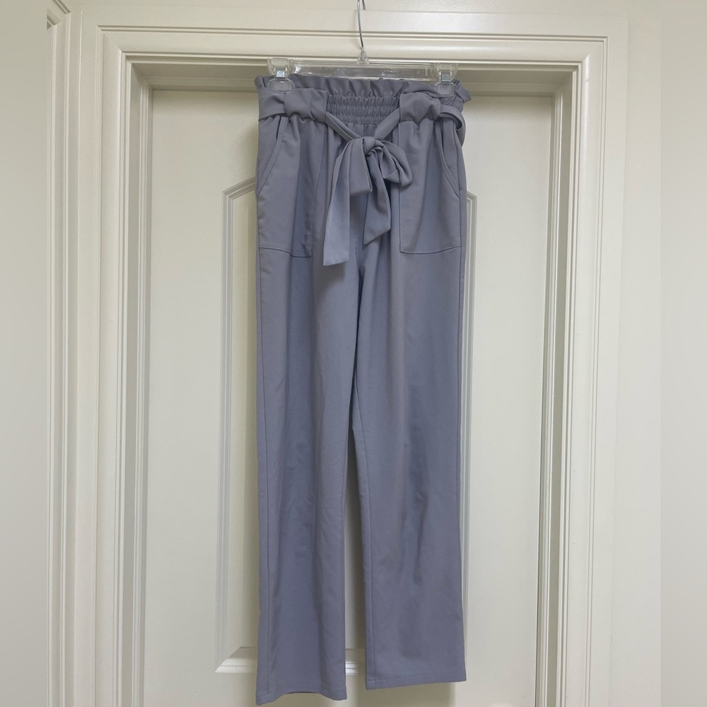 Grey trouser slacks with a tie at the waist